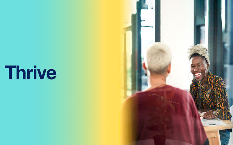 The word ’Thrive’ against a gradient background on the left hand sid