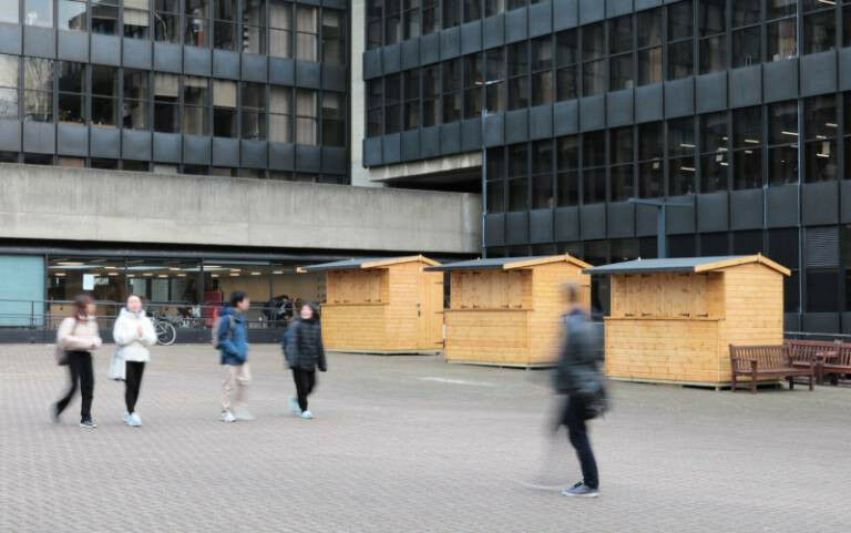 The Ioe concourse with people walking through, in front of the new Canteen on th