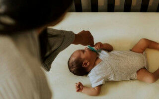 Promoting safer sleeping for babies in England could reduce rates of sudden infant death